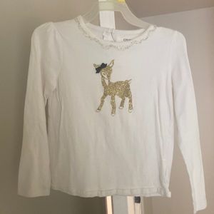 Im selling a white shirt with a glitter deer